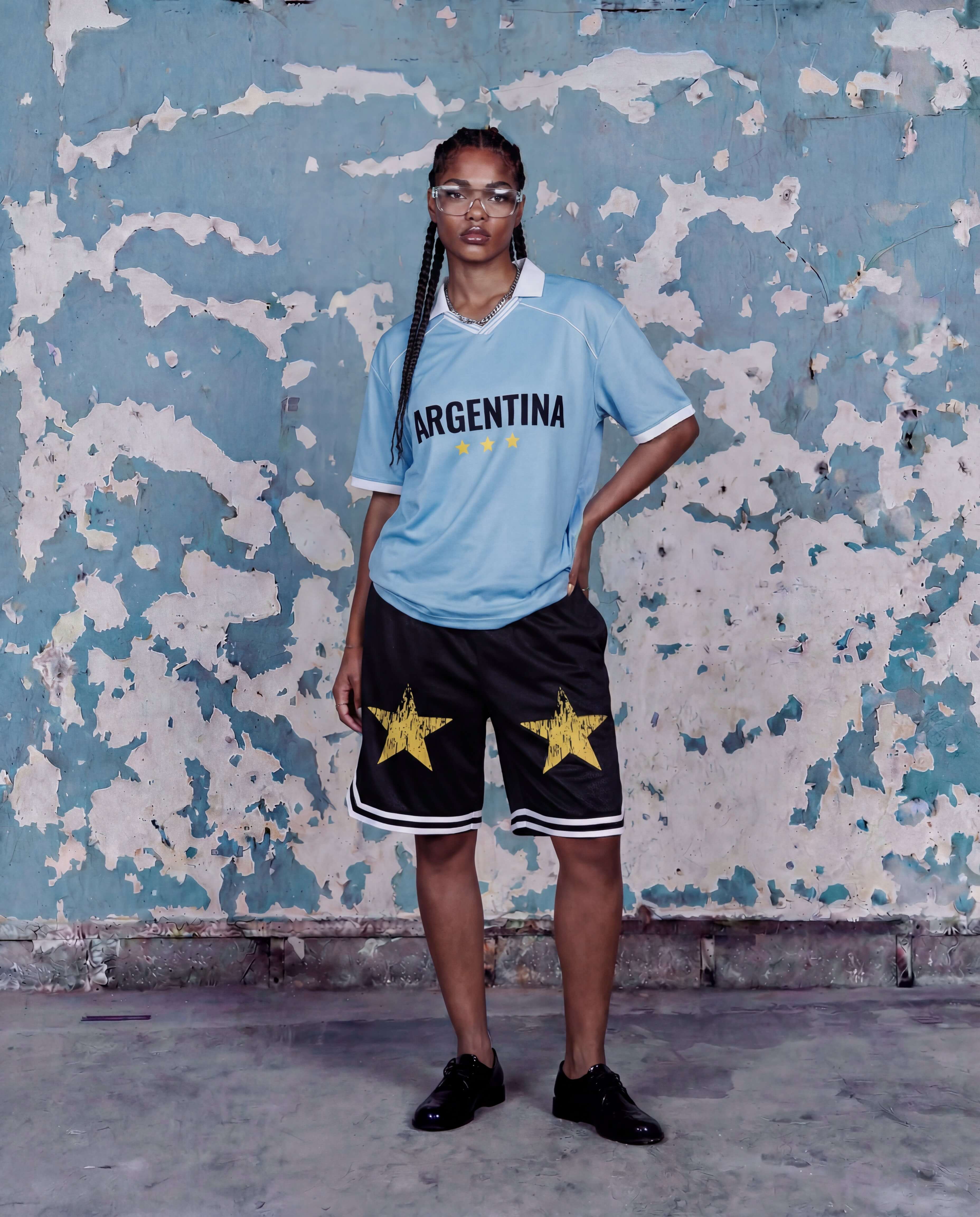 Model wearing an oversized boxy football-inspired jersey for streetwear styling