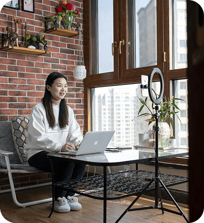 Creator standing inside a creative studio or workspace environment.