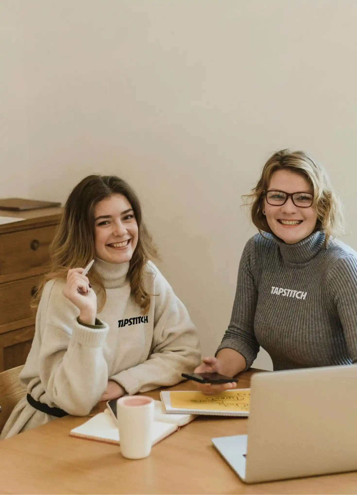 Two girls designed a custom team appeal for the competition, hoping to gain an extra point for the success of the event.